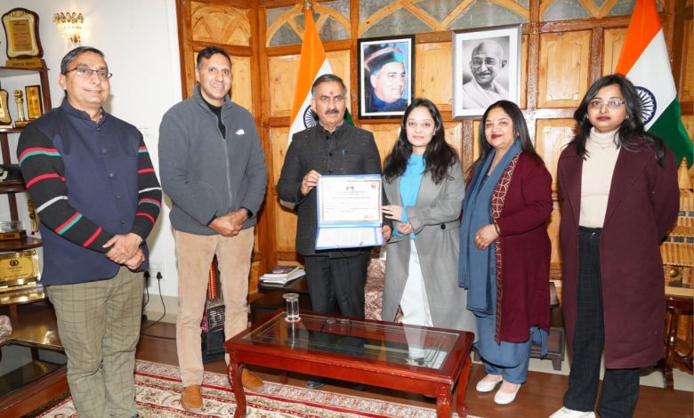hands over land documents to Ms. Nakshatra Singh under Sukh Ashray Yojana