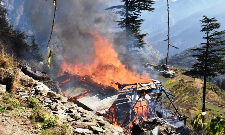 An 18-room wooden house in Parwadi village of Tirthan Valley lies in ashes.